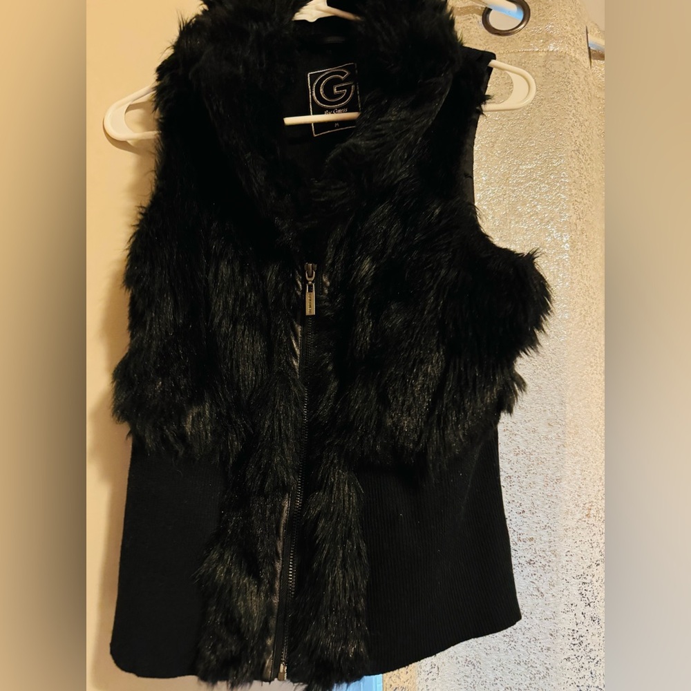 Guess black fur vest.